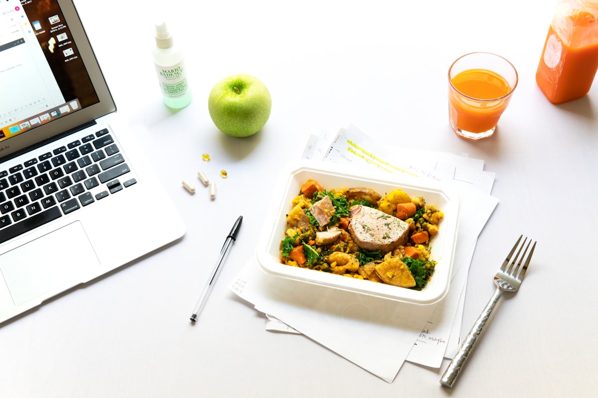 Nutritionist preparing meal guidance materials